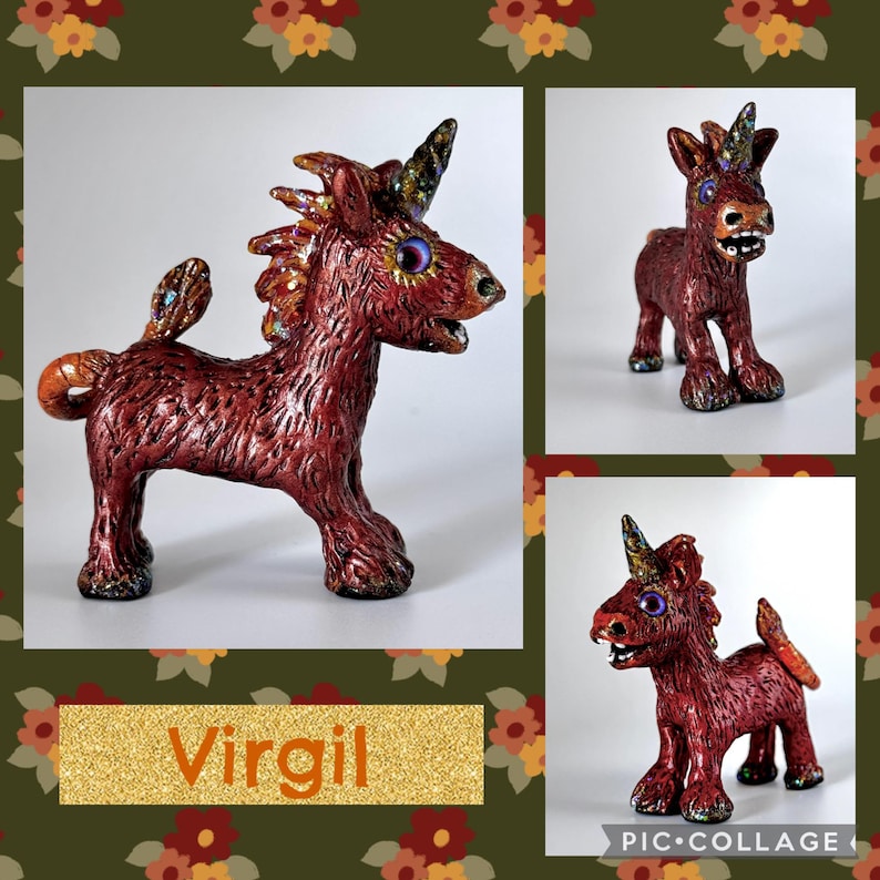 May include: A handcrafted, red-brown unicorn figurine with a textured surface, a spiraled horn, and iridescent accents. The figurine has a whimsical design with large eyes and a curled tail. The name "Virgil" is displayed on a gold glitter background.