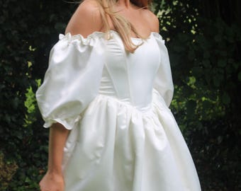 Vestido de novia con corsé de satén, mangas abullonadas con hombros descubiertos, ballenas y espalda con cordones: boda clásica de cuento de hadas, novia romántica