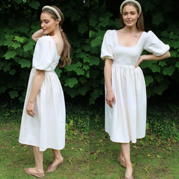 UND PUFF SLEEVE FIT AND FLARE DRESS