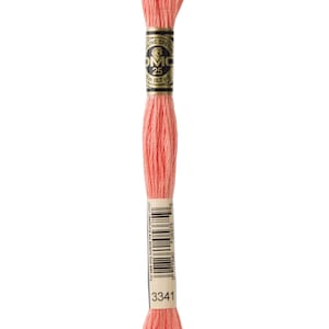 May include: A spool of DMC embroidery floss in colour 3341, a light peach shade. The spool is labelled with the DMC logo and the number 25, indicating the length of the floss. The label also includes the text "For sale only outside the European Union".