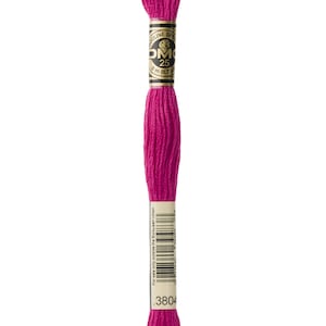 May include: A spool of DMC embroidery floss in a vibrant pink colour. The spool is labelled with the DMC logo and the number 3804. The text "For sale only outside the European Union" is printed on the label.