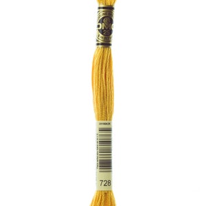 May include: A spool of DMC embroidery floss in colour 728, a bright yellow. The spool is labelled with the DMC logo, the colour number, and the length of the floss in metres and yards.