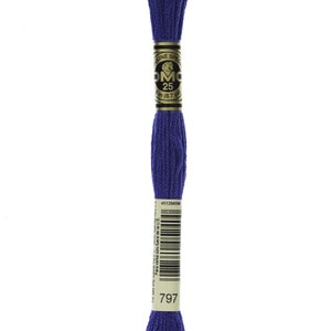 May include: A spool of DMC embroidery floss in colour 797, a deep purple. The label reads "DMC 25" and "3m (8.7 yd)".
