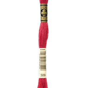 May include: A spool of red embroidery floss with a gold label that reads "DMC 25 8.7 yd 8 m" and "309".