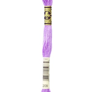 May include: A skein of DMC embroidery floss in colour 209, a light purple shade. The floss is wound around a cardboard spool with a gold label that reads "DMC Special Line 25m (8.7 yd)".