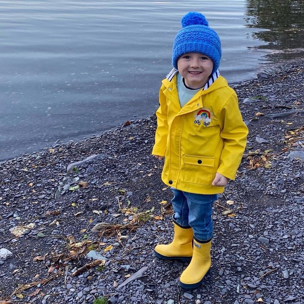 Childrens yellow raincoat shop and boots