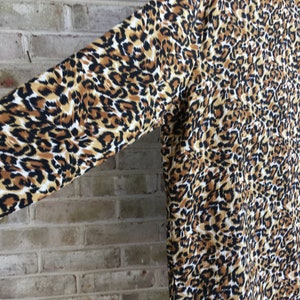 Plus size vintage top animal print size xl long sleeve tunic tiny button in back 1980 tiger roars made in USA