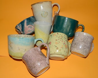 Mugs of different shapes and colors, coffee cup, tea cup, mug