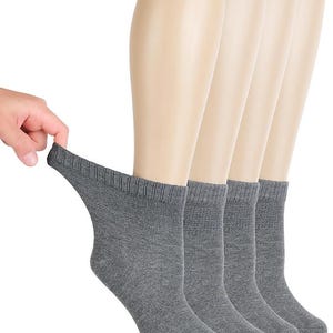 May include: A set of four grey ankle socks featuring a ribbed cuff at the top. The socks are made of a knit fabric with a heathered texture. Each sock has a reinforced heel and toe area, providing a consistent look across all four pieces.
