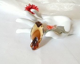 Oval plastic hair clip with gold element from the 60s as a gift for women