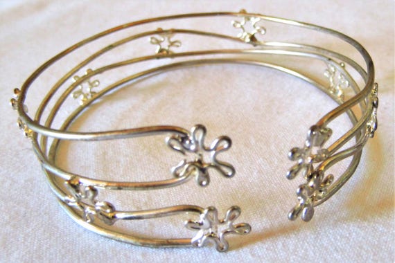 Silver-colored wire bangle with small flowers fro… - image 1