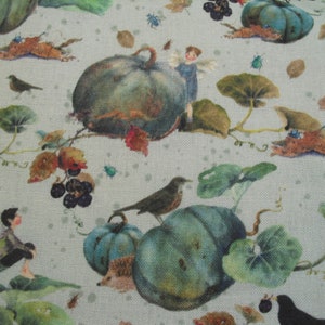 May include: A fabric pattern depicting an autumnal scene with teal pumpkins, birds, fairies, hedgehogs, and falling leaves. The design uses a muted palette of greens, browns, and blues on a light grey background.