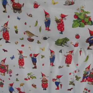 May include: White fabric with a repeating pattern of gnomes in red hats and polka-dot dresses, carrying baskets and interacting with strawberries, butterflies, and other garden elements. The gnomes are depicted in various poses.