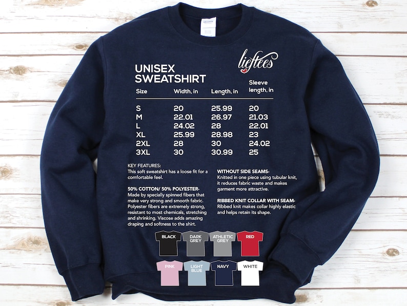 May include: Unisex sweatshirt in navy blue with a size chart and details about the fabric and construction. The chart shows sizes S through 3XL with corresponding width, length, and sleeve length measurements in inches. The text also mentions the fabric composition, which is 50% cotton and 50% polyester. The sweatshirt has a ribbed knit collar with a seam and no side seams. The text also mentions that the sweatshirt has a loose fit for a comfortable feel.