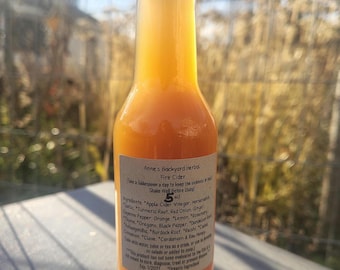 Fire Cider Spicy Extract with Horseradish, Garlic, Ginger, Turmeric, Clove, Cayenne, Lemon, Orange, Thyme, Oregano, Black Pepper & Raw Honey