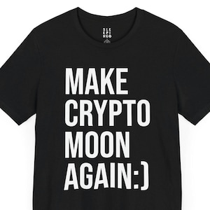 May include: Black t-shirt with white text that reads "MAKE CRYPTO MOON AGAIN:".