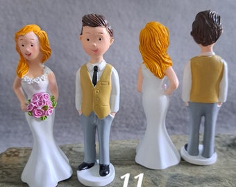 Bride and groom, wedding couple with ankle bracelets, bride and groom dancing, cake figure, doves with rings