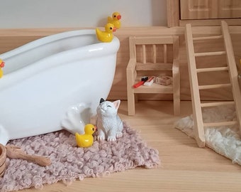 Gnome world, miniatures, bathroom, door, bathtub, ducks, yellow ducks, sauna, bathroom carpet, toothbrush, soap, wooden shoe, gnome, fairies