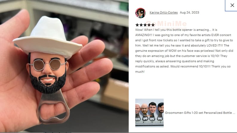 May include: A white bottle opener with a 3D printed face of a person wearing a white cowboy hat and sunglasses. The bottle opener is being held in a hand.