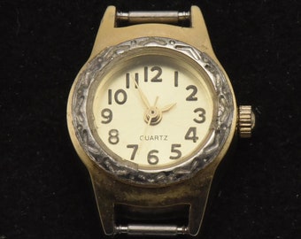 Vintage Gold Tone Metal with Silver Tone Engraved Bezel Analog Watch Face