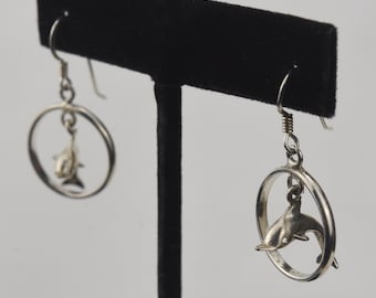 Sterling Silver Dangling Dolphins Hoop Earrings