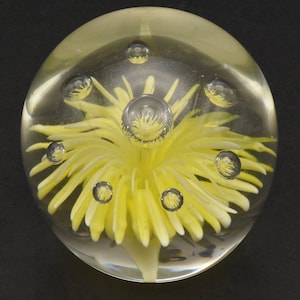 Vintage Light Yellow Flower Encased Glass Paperweight