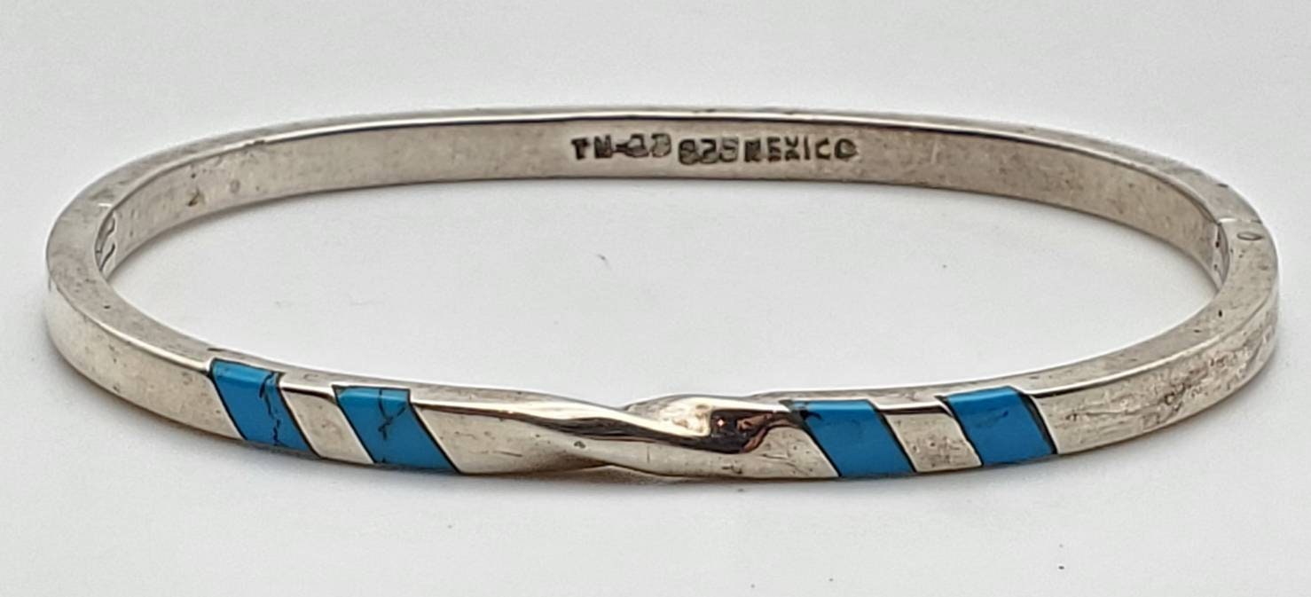ヴィンテージのターコイズ象嵌入りヒンジ付きスターリングシルバー