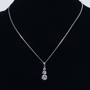 Avon - Sterling Silver Graduated Cubic Zirconia Drop Pendant on Sterling Silver Chain Necklace - 16&quot;