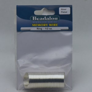 May include: A package of silver plated memory wire, Beadalon Standard Series, Ring - 1/2 oz.