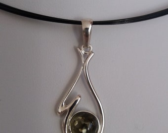 Silver pendant with amber