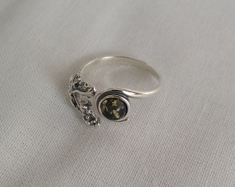 Silver ring with amber