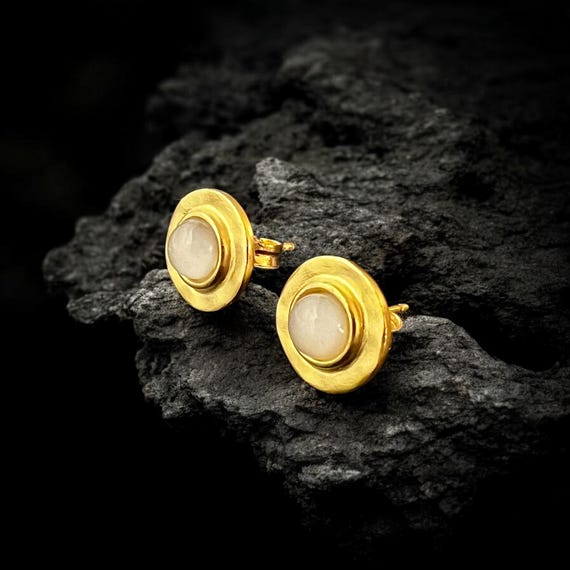 Ebb and Flow Stud Earrings Baltic Gold Moonstone - Round 22K matte gold plated with white glass stone