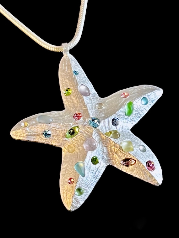 Ebb and flow necklace Seastar - matt silver-plated snake necklace with large starfish pendant