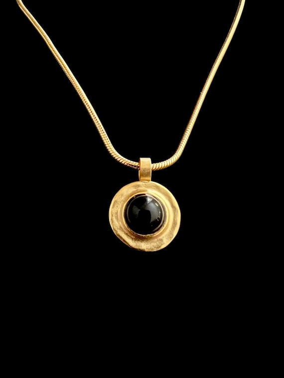 Ebb and Flow Necklace Baltic Gold Black - Snake chain 22K matte gold plated with round pendant with black glass stone and silver leaf