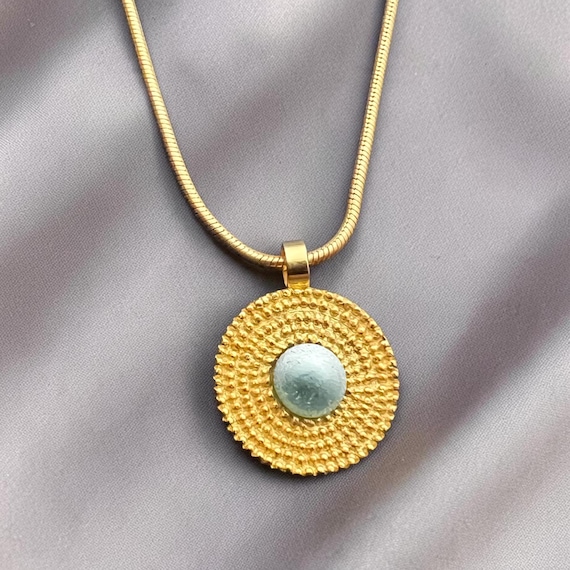 Ebb and Flow Necklace Baltic Gold Aurelia erenite small - Snake necklace 22K matt gold plated with round pendant glass stone/silver leaf