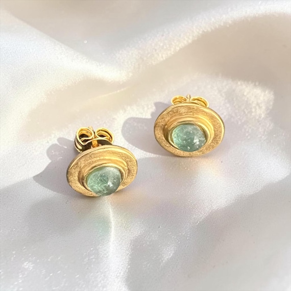 Ebb and Flow Stud Earrings Baltic Gold evenit - Round 22K matte gold plated with Baltic green glass stone with silver leaf - round earrings