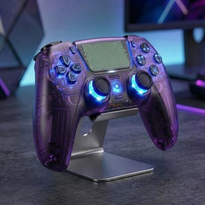 May include: A transparent purple gaming controller with blue LED lights, on a silver stand. The controller has buttons, a directional pad, and two analog sticks. The design is modern, suitable for gamers. The stand is made of metal.