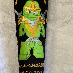 Cône de sucre école ninja avec chaîne de fanions nom 85 cm