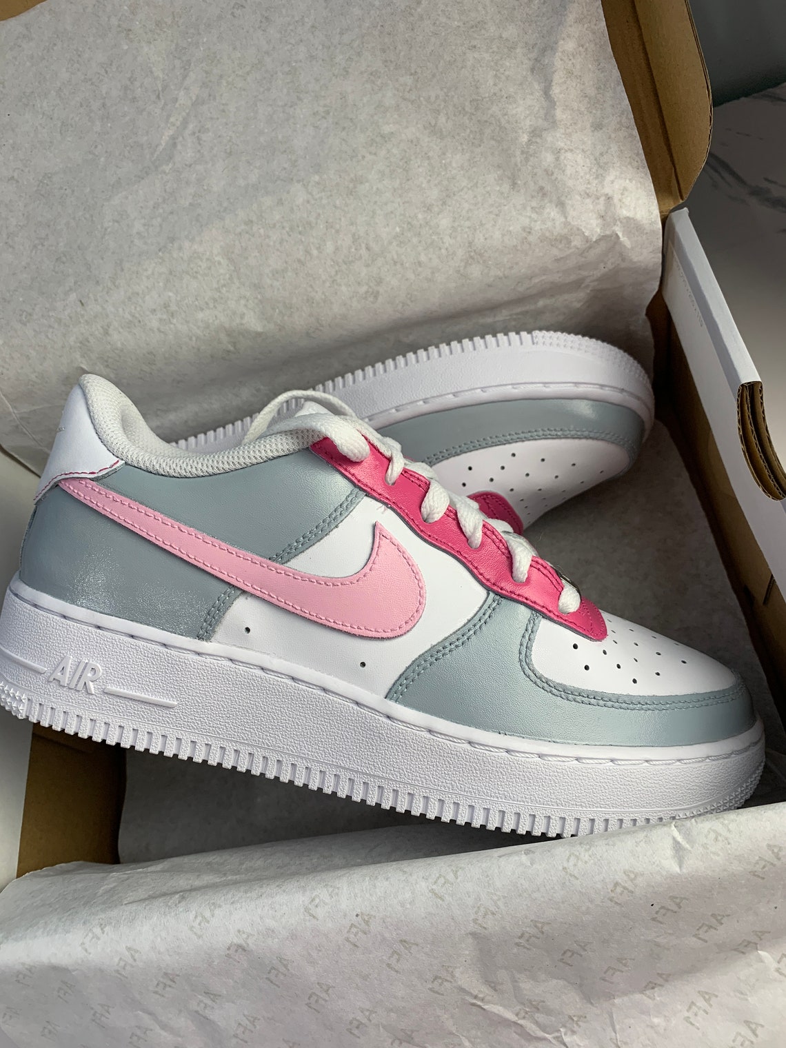 white pink and grey air force 1