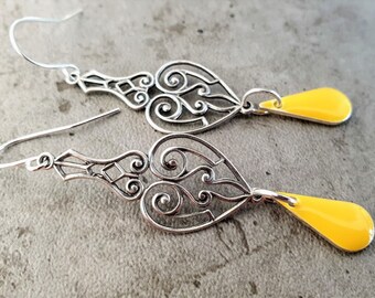 Ornamental Earrings of enameled metal colour yellow