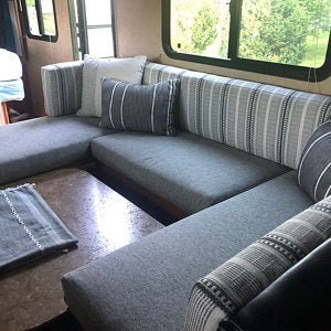 Custom bench seat covers (49”-72” long) that transform your trailer, motor home, van, RV, or Camper.  Send us your fabric