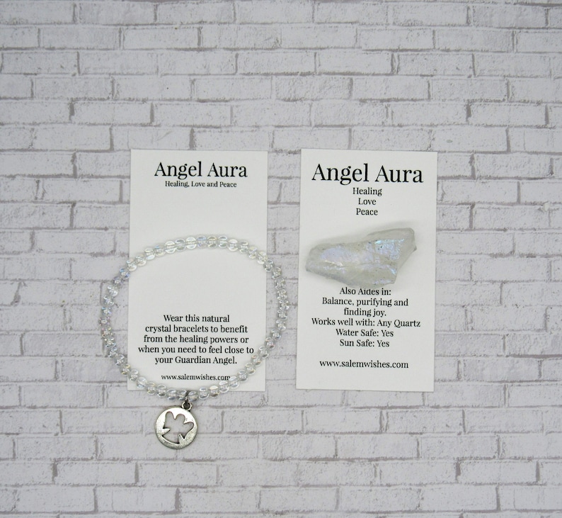 May include: A white crystal bracelet with an angel charm. The card reads "Angel Aura Healing, Love and Peace" and lists the benefits of the crystal. The card also includes the website address www.salemwishes.com.