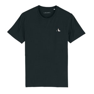May include: A dark navy blue t-shirt with a small white embroidered bird design on the chest. The text "LIGARTI" is printed on the shirt.