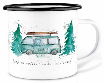 May include: White enamel mug with a black rim featuring a green vintage van with surfboards on top, driving through a watercolor forest scene. The text "keep on rollin' under the stars" is printed below the van.