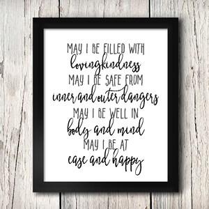 May include: Black and white printable wall art with a quote that reads: "MAY I BE FILLED WITH lovingkindness MAY I BE SAFE FROM inner and outer dangers MAY I BE WELL IN body and mind MAY I BE AT ease and happy"
