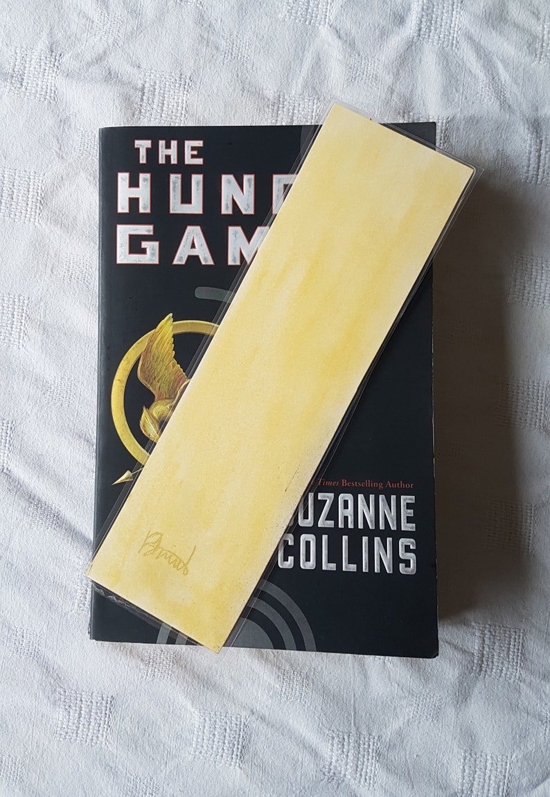 the hunger games bookmark etsy