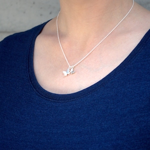 necklace with pendants: butterfly little and mini - silver, white gold