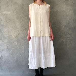 Vintage classic sleeveless cream silk shirt/vintage cream silk blouse/collarless silk button up/minimalist silk top
