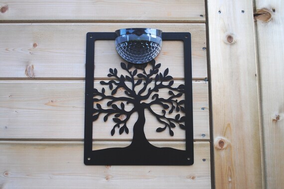 Solar light wall on sale plaque