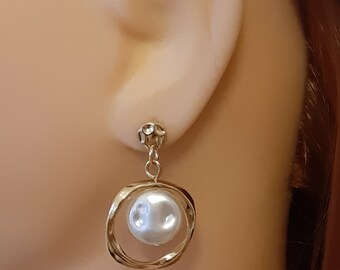 Golden earrings with faux pearl pendants